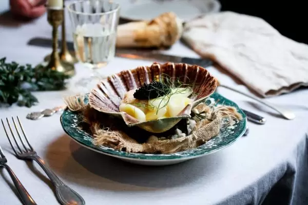 Joris Bijdendijk: coquilles met beurre blanc en gestoofde prei